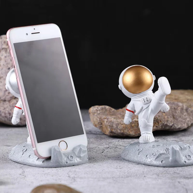 Hermoso soporte para celular o tablet de astronauta